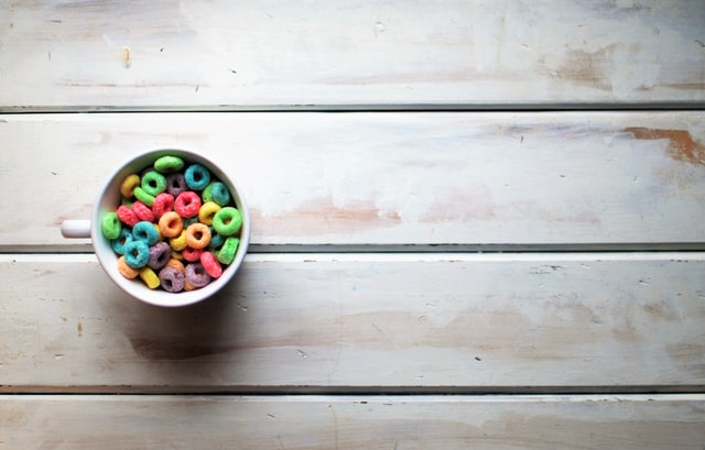 A cup of colourful cheerios