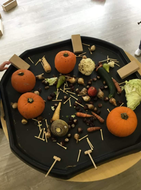 Pumpkins being used in fun activities at nursery